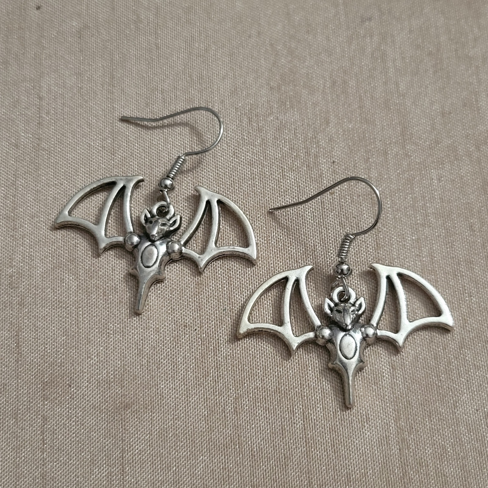 Silver Tone Bat Hook Earrings 12$